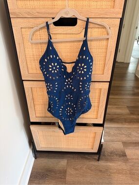 Cutout Navy One-Piece Swimsuit with Floral Laser-Cut Detail and matching Skirt